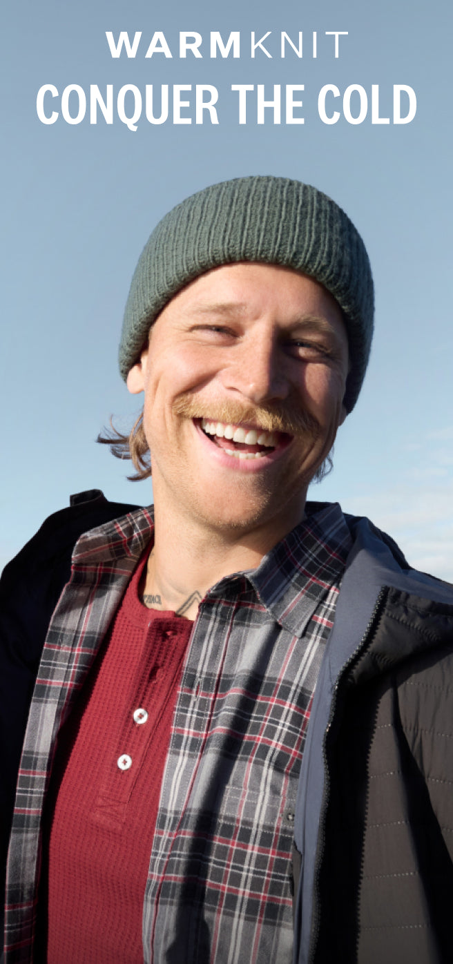 Man wearing WARMKNIT Flannel Shirt and WARMKNIT AIR Hooded Jacket