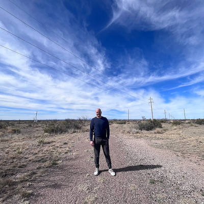 Man standing in a desert wearing Mack Weldon clothing