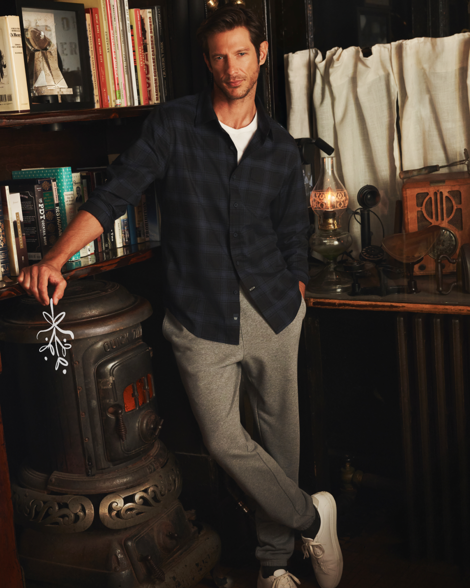 Man wearing WARMKNIT Flannel Shirt in Deep Well - Baltic Plaid
