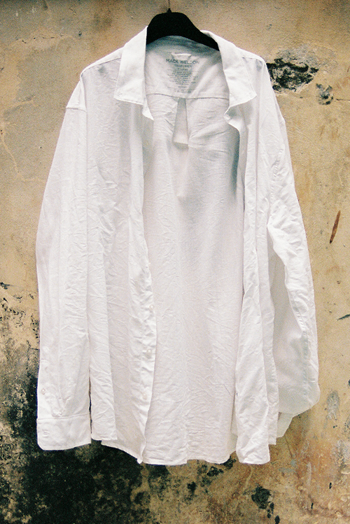 Image of Tech Linen Button Up in bright white hang on.