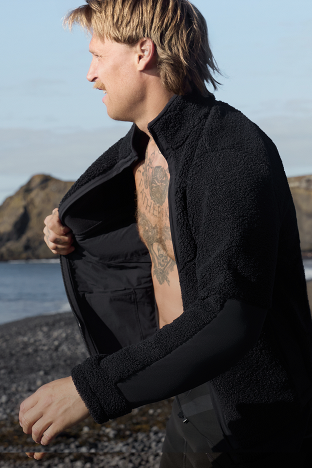 Man wearing WARMKNIT Sherpa Fleece in True Black