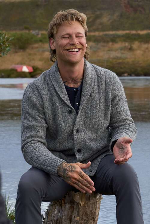 Man smiling, wearing Warmknit Wool Cardigan in Salt & Pepper