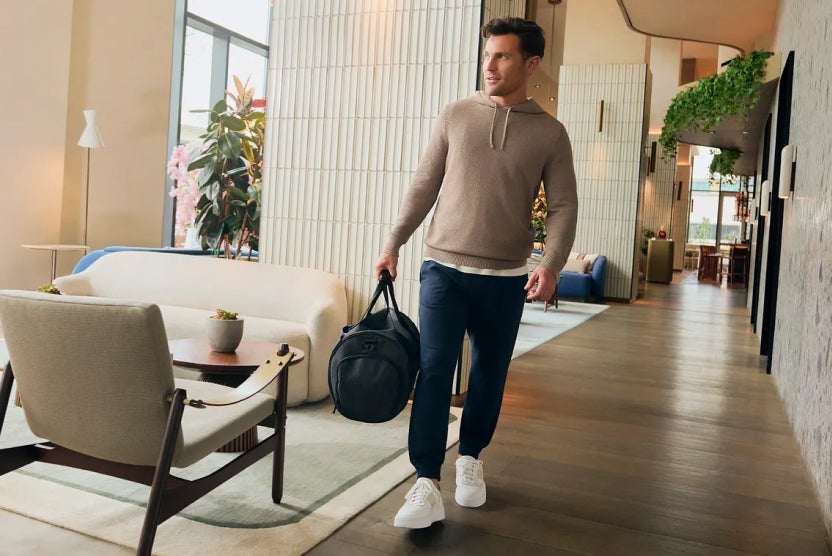 Nicky Kelvin wearing Tech Linen Hoodie and ACE Sweatpants.