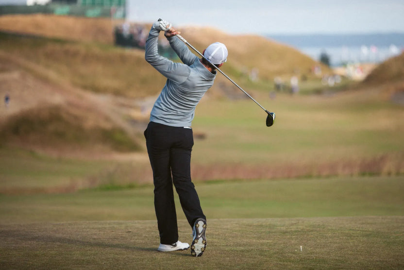 Shane Bacon playing golf