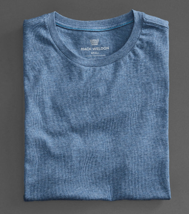 image of a SILVER shirt folded on a backdrop