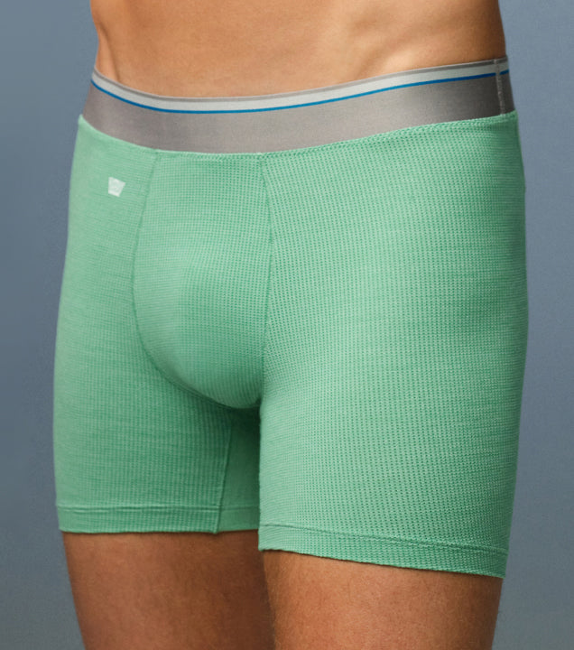 image of a man wearing bright green AIRKNITx boxer briefs
