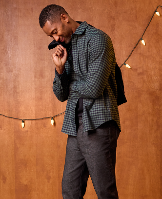 Man wearing Mack Weldon warmknit flannel shirt